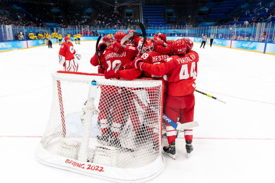 Goaltender Ivan Fedotov of Russia celebrates with teammates
