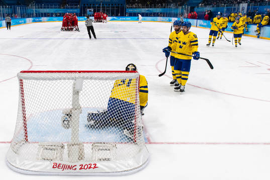 Goaltender Lars Johansson, Oscar Fantenberg and Anton