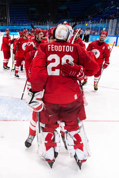 Goaltender Ivan Fedotov of Russia celebrate with teammates