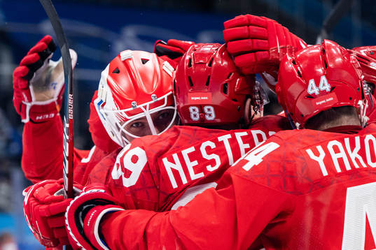 Goaltender Ivan Fedotov of Russia celebrate with teammates