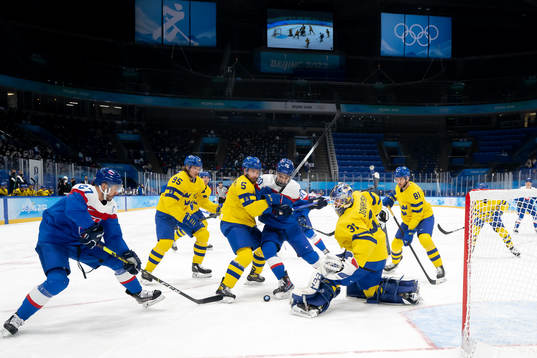 Oscar Fantenberg of Sweden against Juraj Slafkovsky of