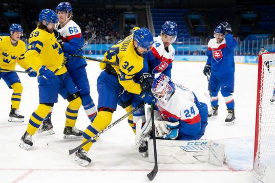 Daniel Brodin of Sweden in front of goaltender Patrik Rybar