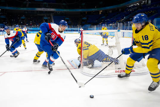 Kristian Pospisil of Slovakia against goaltender Lars