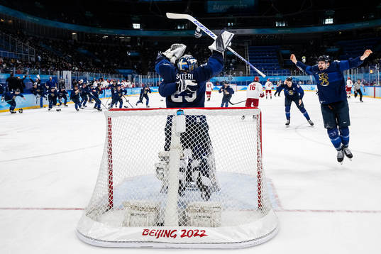Players of Finland celebrate with goaltender Harri Säteri