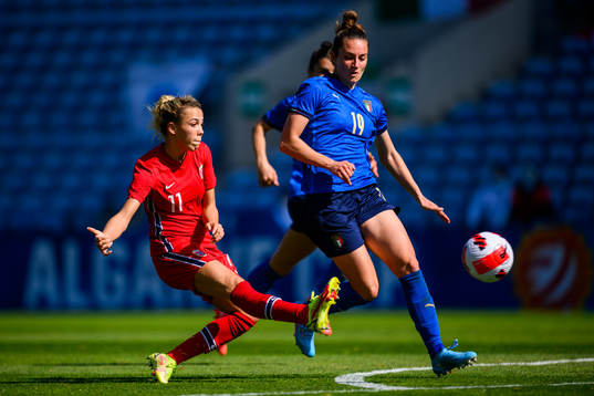 Celin Bizet Ildhusøy of Norway scores 1-2 guarded by