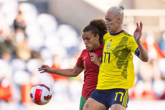 Andreia Norton of Portugal and Caroline Seger of Sweden