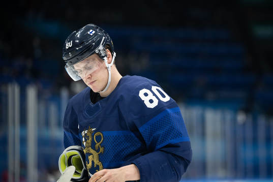 Saku Mänalanen of Finland looks dejected in the men's ice