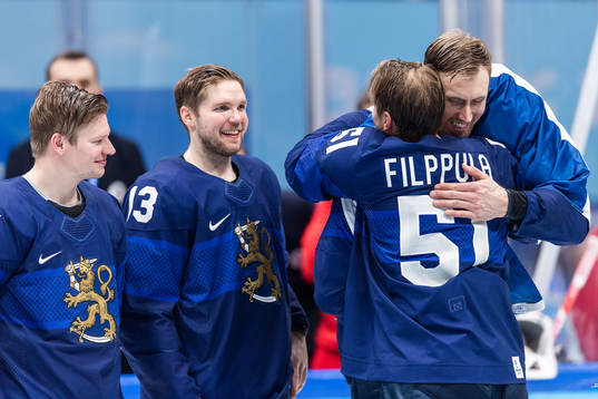 Marko Anttila and Valtteri Filppula of Finland celebrate