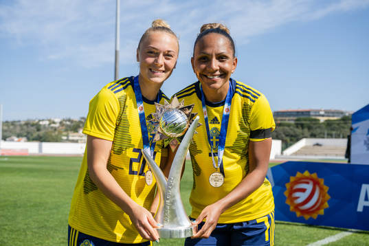 Hanna Bennison and Madelen Janogy of Sweden celebrate with