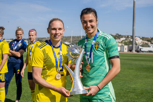 Jonna Andersson and goalkeeper Zecira Musovic of Sweden