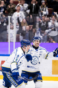 Leksands Calle Själin och Leksands Matt Caito jublar