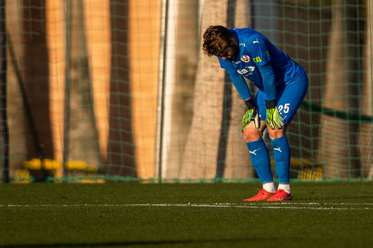 Goalkeeper Kalle Joelsson of Helsingborg in pain