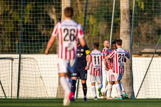 Players of Tromsø  celebrate scoring 1-1