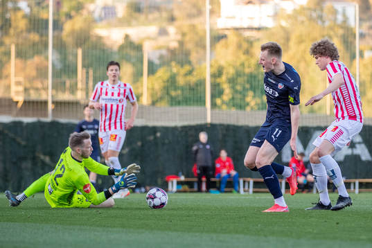 Goalkeeper Simon Thomas of Tromsø and Rasmus Karjalainen