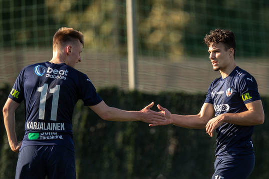 Rasmus Karjalainen and Assad Al Hamlawi of Helsingborg
