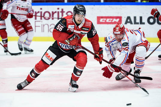 Malmö Redhawks Anton Olsson och Timrås Morten Madsen