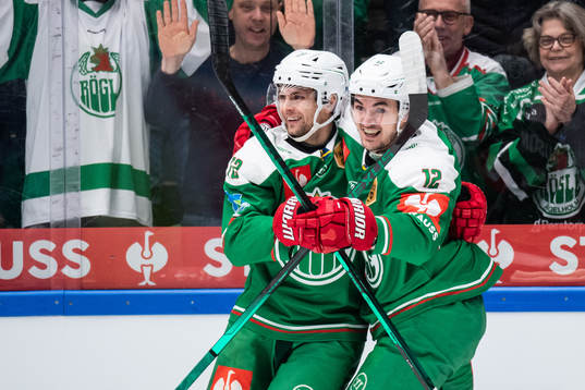 Daniel Zaar and Brady Ferguson of Rögle celebrate