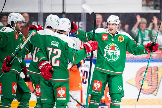Adam Tambellini and Daniel Zaar of Rögle celebrate