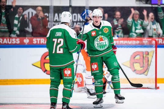 Daniel Zaar and Oskar Stål Lyrenäs of Rögle celebrate