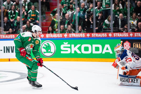 Dennis Everberg of Rögle and goalkeeper Christian Heljanko