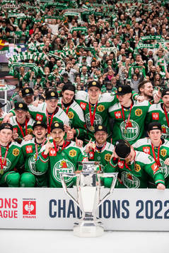 Players of Rögle celebrate with the trophy