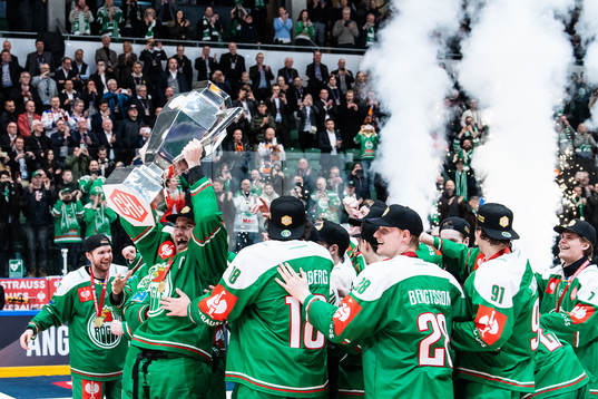 Players of Rögle celebrate with the trophy