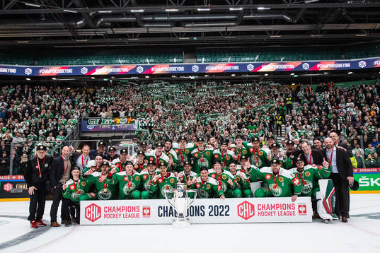 Players of Rögle celebrate with the trophy