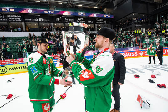 Brady Ferguson and Ted Brithén of Rögle celebrate with