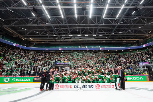 Players of Rögle celebrate with the trophy