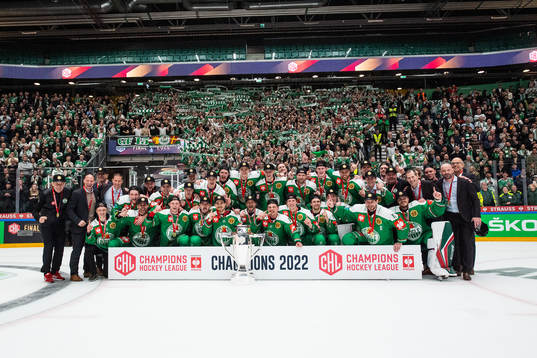 Players of Rögle celebrate with the trophy