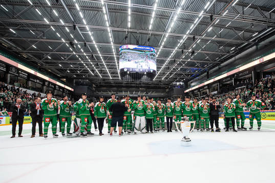 Players of Rögle celebrate with the trophy