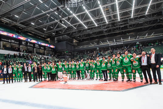 Players of Rögle celebrate with the trophy