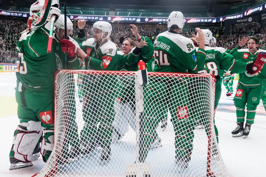 Players of Rögle celebrate with goalkeeper Christoffer