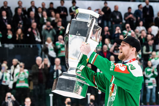 Ted Brithén of Rögle celebrates with the trophy