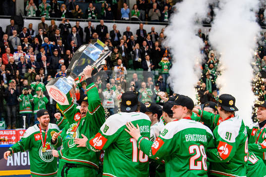 Mattias Sjögren of Rögle lifts the trophy