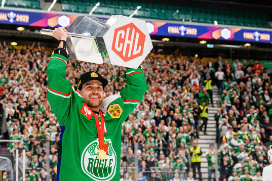 Ludvig Larsson of Rögle lifts the trophy