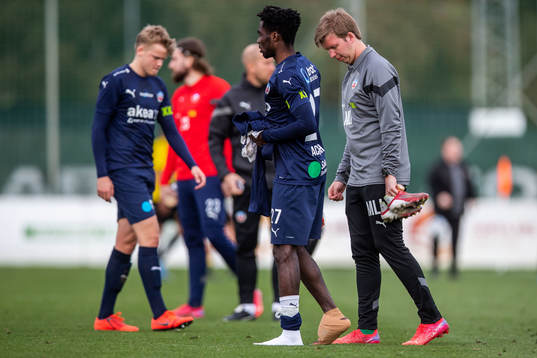 Benjamin Acquah and Marcus Linnér, physiotherapist of