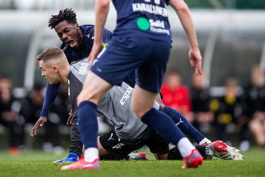 Goalkeeper Maksim Rudakov of Honka and Benjamin Acquah of