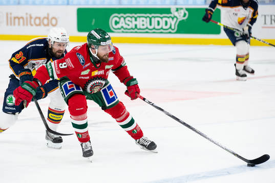 Djurgårdens Dick Axelsson och Frölundas Jan Mursak