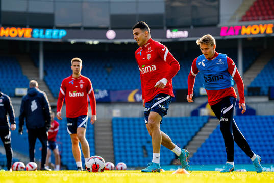 Mohamed Elyounoussi and Martin Ødegaard of the Norwegian