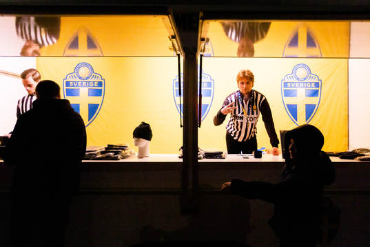 Staff at the official merch store