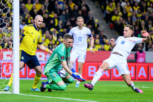 Marcus Danielson and goalkeeper Robin Olsen of Sweden