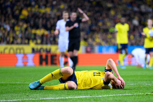 Dejan Kulusevski of Sweden in pain