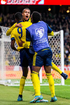 Robin Quaison celebrates with Alexander Isak and Anthony