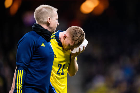 Dejan Kulusevski of Sweden with an ice pack against his