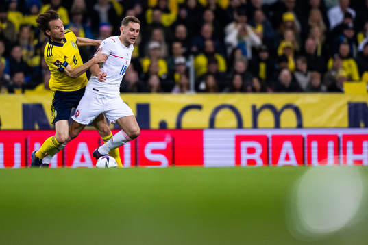 Albin Ekdal of Sweden pulls at Jan Kuchta of Czech Republic
