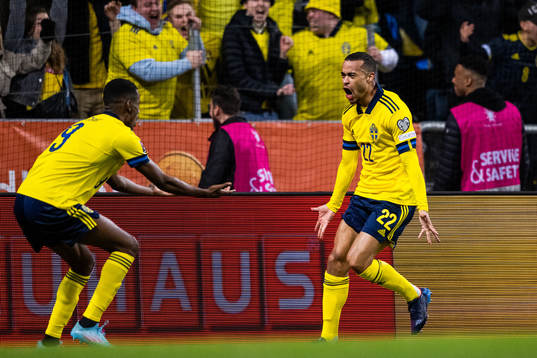 Alexander Isak and Robin Quaison of Sweden celebrate