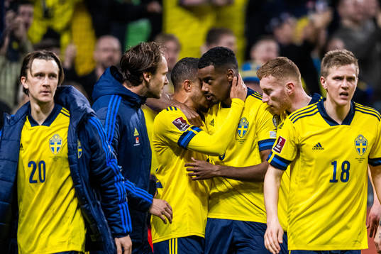 Robin Quaison of Sweden celebrates with team mates