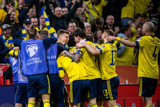 Robin Quaison of Sweden celebrates with team mates