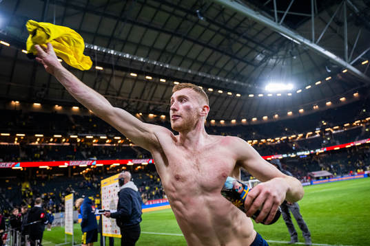 Dejan Kulusevski of Sweden throws his shirt